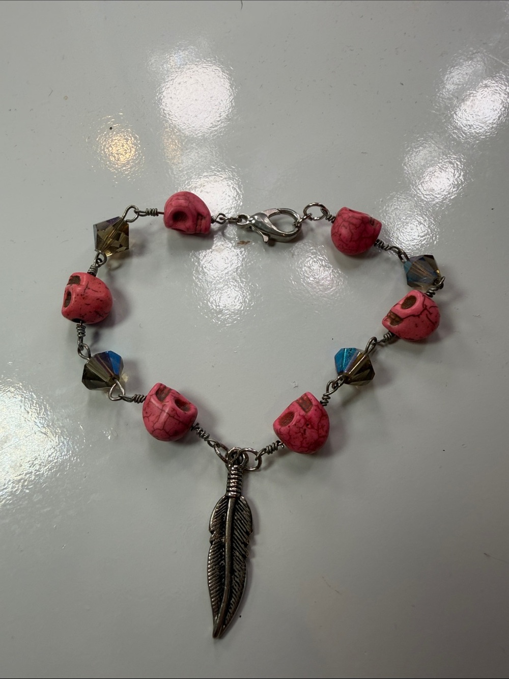 Pink Skull Bead Bracelet with Feather Charm